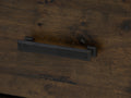 Close-up of handle on Caro Rustic Coffee Table - Dark Solid Wood, highlighting the rich grain and texture of the solid wood surface.