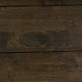Close-up view of dark solid wood texture from the Caro Rustic Coffee Table - Dark Solid Wood showcasing rich grain patterns.