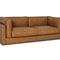 Eleganza Tan Distressed Leather 3 Seater Sofa showcasing its luxurious design and soft leather finish.