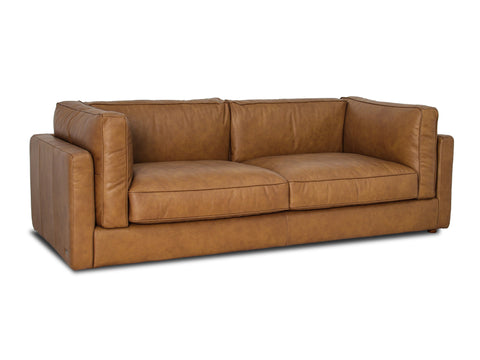 Eleganza Tan Distressed Leather 3 Seater Sofa showcasing its luxurious design and soft leather finish.