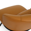 Close-up of the Fancyoni Cognac Leather Minimalist Accent Chair with sculpted curves and elegant leather upholstery.