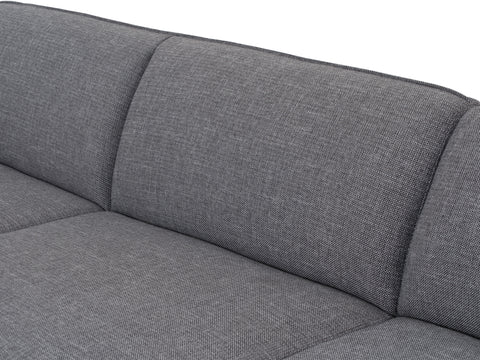 Close-up of Livia Grey Scandi Modern Sectional with charcoal upholstery and sleek design