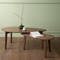 Lorenzo Nesting Coffee Tables Set of 2 with walnut veneer tops in a modern living room setting.
