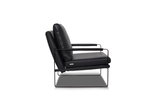 Luna Modern Leather Black Accent Chair with sleek design and premium semi-aniline leather upholstery side angle..