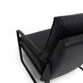 Luna Modern Leather Black Accent Chair with sleek design and premium semi-aniline leather upholstery close up.