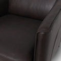 Lusso Vintage brown leather lounge chair showing dark chocolate leather upholstery and sleek design.