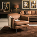 Lusso vintage Chestnut Brown leather accent chair in modern living room setting with complementary decor.