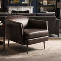 Lusso Vintage brown leather lounge chair in a stylish living room setting with modern decor.