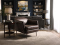 Lusso Vintage brown leather lounge chair in a stylish living room setting with modern decor.