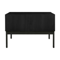 Marcello Black Rectangular Coffee Table with oak veneer finish, open shelf, and drawer, elevated on iron legs for modern living spaces.