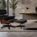 Meseo Black Leather Lounge Chair and Ottoman in a modern office setting, featuring elegant design and luxurious comfort.