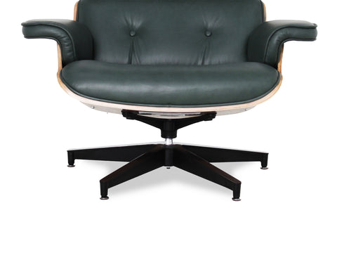 Meseo Royal Green Leather Lounge Chair and Ottoman featuring a sleek design with black base and plush green leather upholstery.