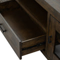 Close-up of open drawer in Mira Rustic TV Stand made of dark wood, highlighting detailed craftsmanship and weathered finish.