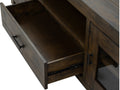 Close-up of open drawer in Mira Rustic TV Stand made of dark wood, highlighting detailed craftsmanship and weathered finish.