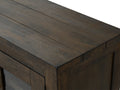 Close-up of Mira Rustic TV Stand showcasing dark wood grain texture and solid oak construction.