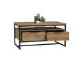 Moda industrial Style Coffee Table with wood-look design, black metal frame, open shelf, and two drawers, styled with books and decor.