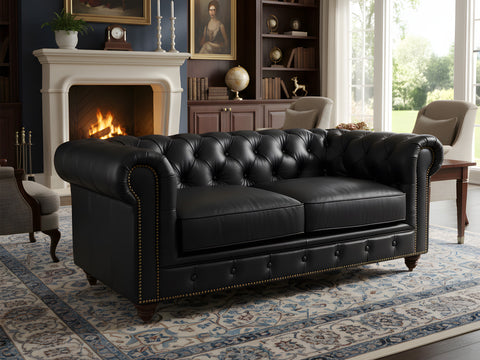 Stanhope Black Loveseat Chesterfield in elegant room with fireplace