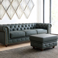 Stanhope Royal Green Leather Chesterfield Ottoman in a living room setting, showcasing luxurious aniline leather and British design.