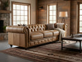 Stanhope Camel Brown Distressed Leather 4 Seater Chesterfield in rustic living room setting