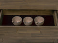 Nero Mid-Century Fluted Door Sideboard with Brass Handles drawer interior displaying three textured silver bowls.