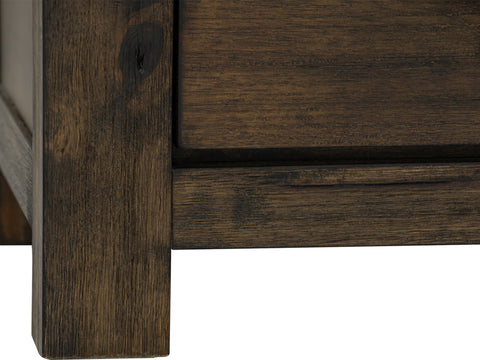Close-up of dark solid wood detail on Pia Rustic Bookcase showcasing the rich natural grain and texture.