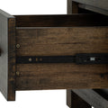 Drawer detail of Pia Rustic Bookcase - Dark Solid Wood, showcasing warm tones and natural wood grain.