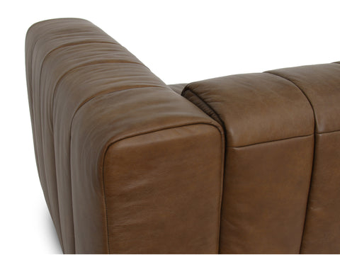 Portfino Vintage Brown Channel tufted leather sofa side view showing luxurious leather texture and channel tufting.