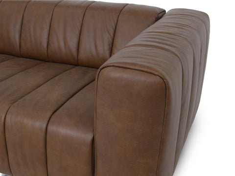 Portfino Vintage Brown Channel tufted leather sofa showcasing luxurious leather texture and sleek, modern design.
