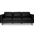 Selina Mid-Century Leather Black 3-Seater Sofa with structured design and soft cushions.
