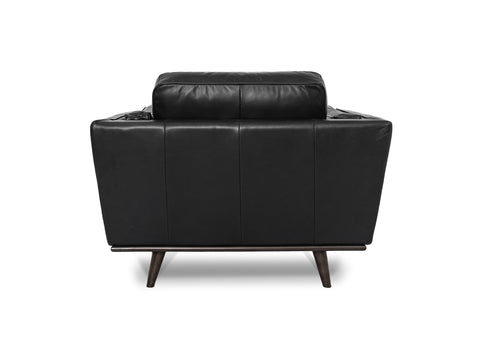 Back view of the Selina Midcentury Black Leather Accent Chair showcasing its sleek design and smooth leather finish.