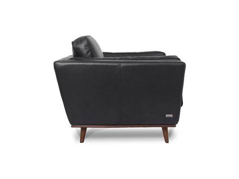 Selina Midcentury Black Leather Accent Chair side view, featuring rich leather upholstery and elegant wooden legs.