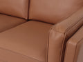 Close-up of Selina Midcentury Brown Leather Loveseat Sofa showcasing soft leather cushions and structured armrest.
