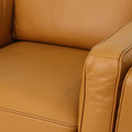 Selina Midcentury Cognac Leather Accent Chair close-up of luxurious cognac leather upholstery