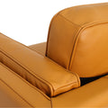 Close-up view of the Selina Midcentury Cognac Leather Loveseat Sofa showcasing its soft leather and elegant design.