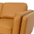 Close-up view of Selina Midcentury Cognac Leather Loveseat Sofa showcasing soft leather upholstery and modern design.