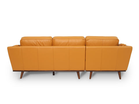 Selina Midcentury Cognac Leather Sectional Sofa back view showcasing elegant design and plush seating.