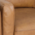 Selina Midcentury Tan Leather 3 Seater Sofa close-up view showcasing soft leather and cushion details.
