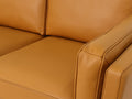Close-up of Selina Midcentury Cognac Leather Sectional Sofa showcasing plush leather upholstery.